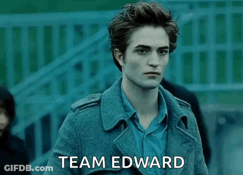 A Man In A Trench Coat With The Words Team Edward Written On The Bottom GIF