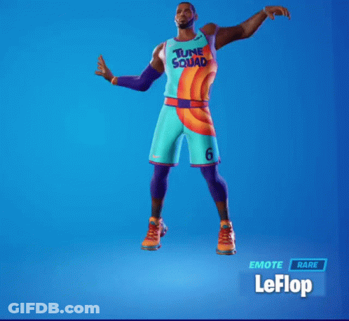 A Man In A Tune Squad Jersey Is Dancing GIF