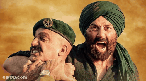 A Man In A Turban Is Holding Another Man In A Beret With A Star On It GIF
