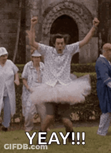 A Man In A Tutu Is Jumping In The Air In Front Of A Group Of People And The Caption Says Yeay !!! GIF