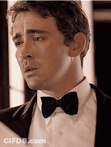 A Man In A Tuxedo And Bow Tie GIF