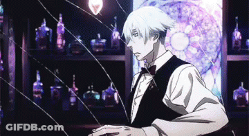 A Man In A Tuxedo And Bow Tie Is Standing In Front Of A Broken Glass Window . GIF