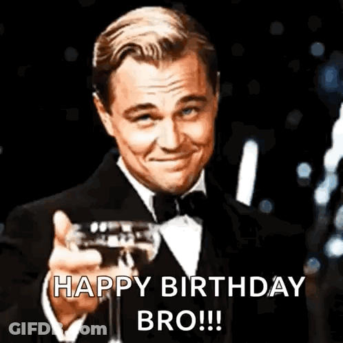 Tuxedo Man Holding Champagne Saying Happy Birthday Bro GIF