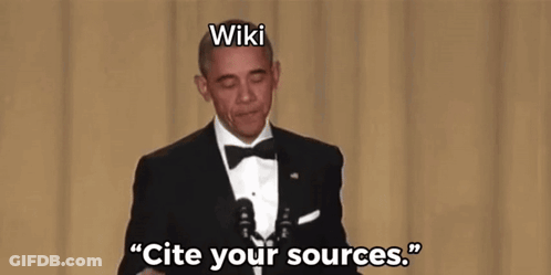 A Man In A Tuxedo Is Holding A Microphone And Says " Cite Your Sources " GIF