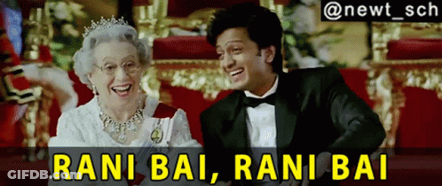 A Man In A Tuxedo Is Laughing Next To An Elderly Woman With The Caption Rani Bai Rani Bai GIF