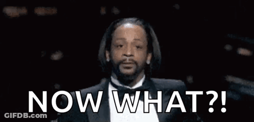 A Man In A Tuxedo Is Saying `` Now What '' . GIF