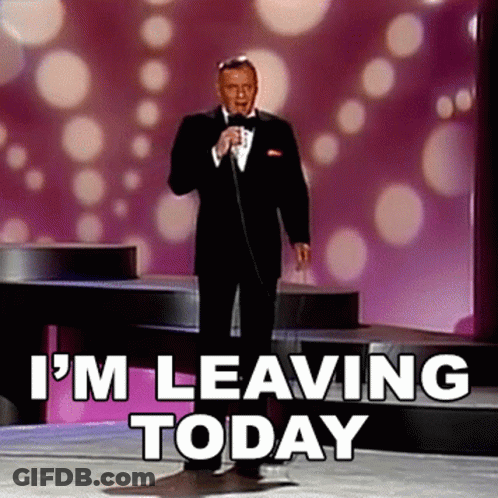 A Man In A Tuxedo Is Singing Into A Microphone With The Words " I 'M Leaving Today " Behind Him GIF