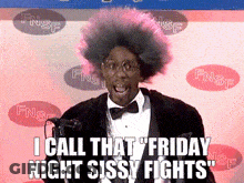 A Man In A Tuxedo Is Speaking Into A Microphone And Says I Call That Friday Night Sissy Fights GIF