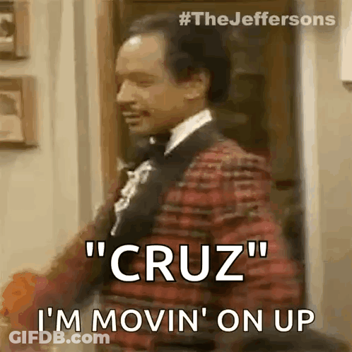 A Man In A Tuxedo Is Standing In A Doorway And Saying `` Cruz '' I 'M Movin ' On Up GIF