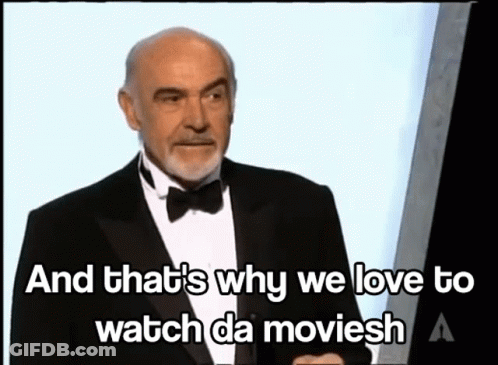 A Man In A Tuxedo Says " And That 'S Why We Love To Watch Da Moviesh " GIF