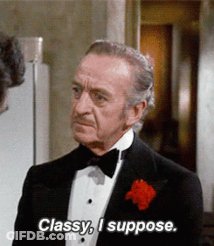 A Man In A Tuxedo Says Classy I Suppose .. GIF