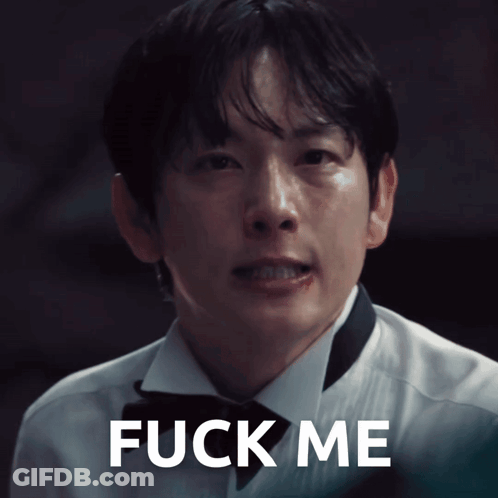A Man In A Tuxedo Says " Fuck Me " In White Letters GIF