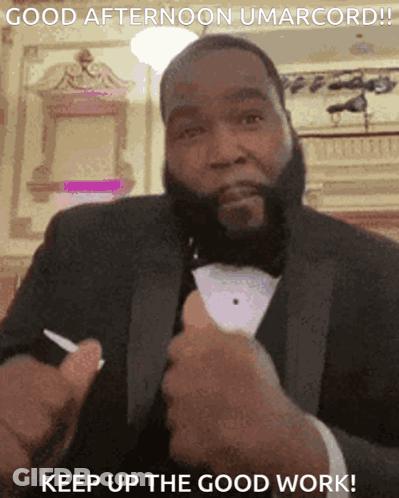 A Man In A Tuxedo Says Good Afternoon Umarcord Keep Up The Good Work GIF