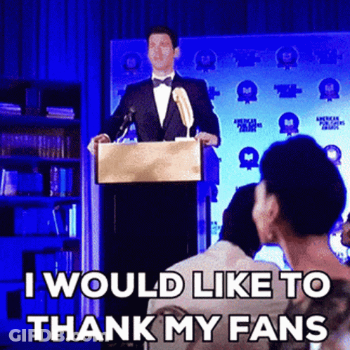 A Man In A Tuxedo Stands At A Podium Giving A Speech And Says I Would Like To Thank My Fans GIF