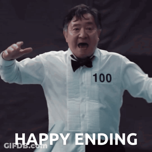 A Man In A Tuxedo With The Number 100 On His Chest GIF