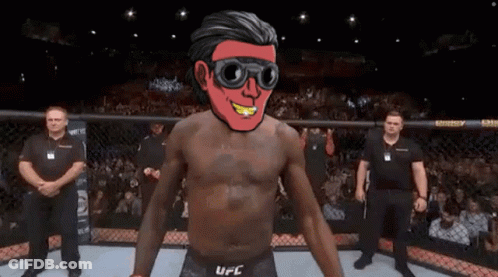 A Man In A Ufc Ring With A Red Face GIF