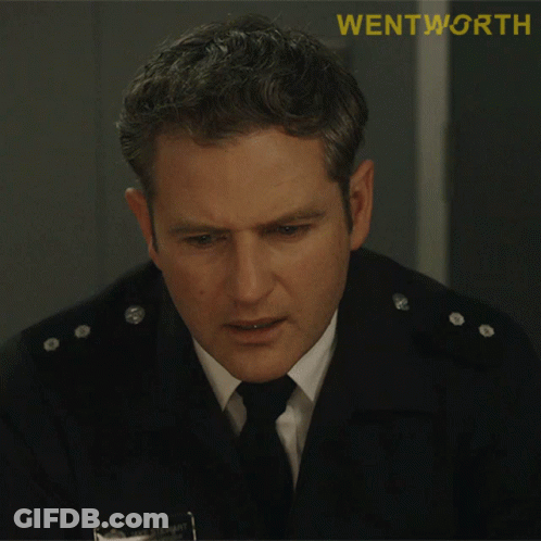 A Man In A Uniform With The Word Wentworth On The Bottom Right GIF