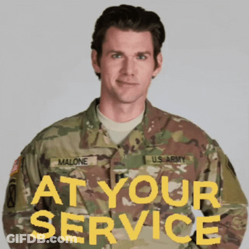 A Man In A Us Army Uniform With The Words At Your Service Behind Him GIF