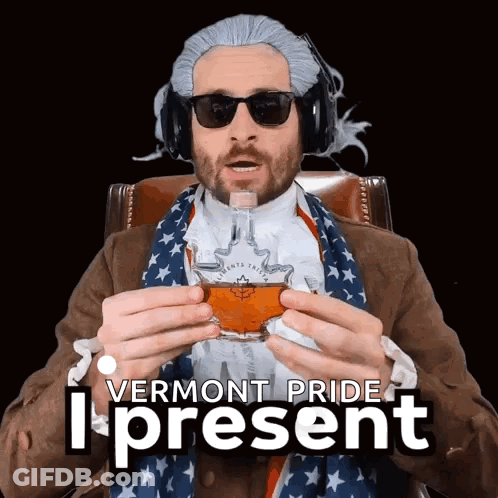 A Man In A Vermont Pride Costume Is Holding A Glass GIF