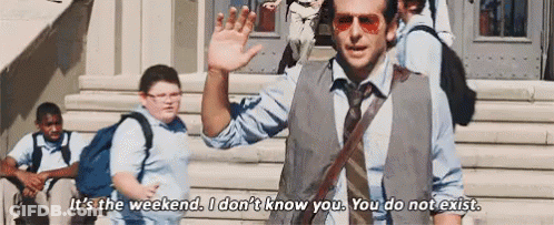 A Man In A Vest And Tie Is Waving At A Group Of Children While Standing On A Set Of Stairs . GIF