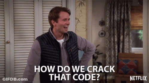 A Man In A Vest Says How Do We Crack That Code In A Netflix Ad GIF