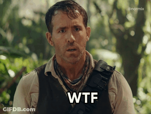 A Man In A Vest With The Word Wtf Written On His Chest GIF