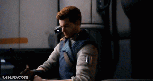 A Man In A Video Game Is Holding A Gun In His Hand . GIF