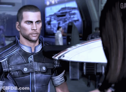 A Man In A Video Game Is Standing Next To A Woman With The Word Ga On The Bottom Right GIF