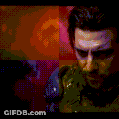 A Man In A Video Game Is Talking To Another Man In A Dark Room GIF