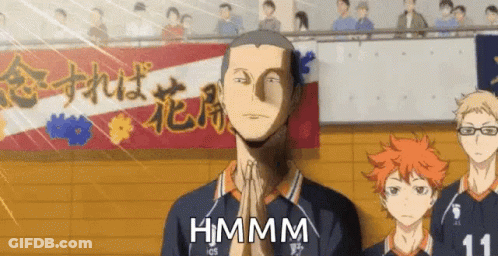A Man In A Volleyball Uniform Is Praying With His Hands Folded In Front Of A Crowd Of People . GIF