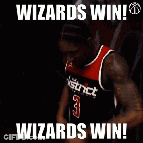 A Man In A Washington D.c. Wizards Jersey Is Celebrating GIF