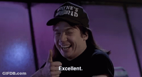 A Man In A Wayne 'S World Hat Gives A Thumbs Up GIF