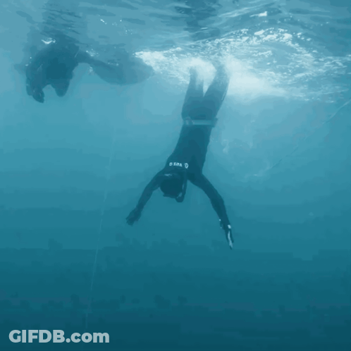 A Man In A Wet Suit With The Word Mares On The Back GIF