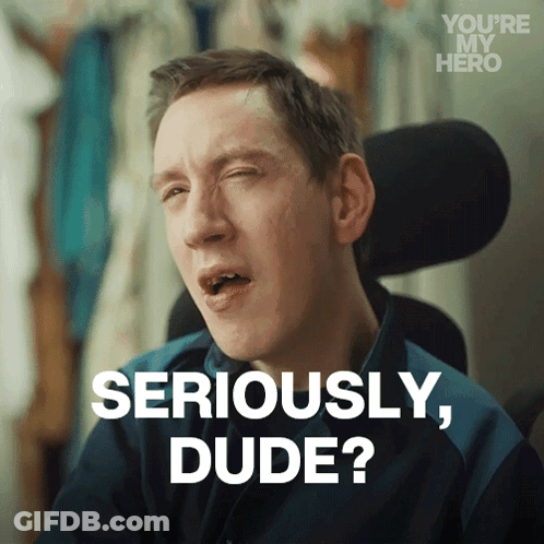 A Man In A Wheelchair Is Making A Funny Face And Says Seriously Dude GIF