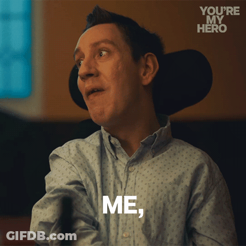 A Man In A Wheelchair Says " Me " In White Letters GIF