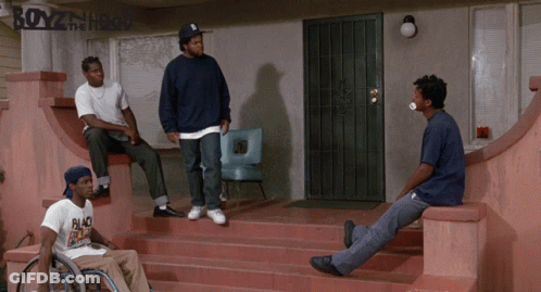 A Man In A Wheelchair Sits On The Steps Of A Boyz In The Hood House GIF