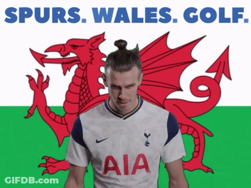 A Man In A White Aia Jersey Stands In Front Of A Dragon GIF
