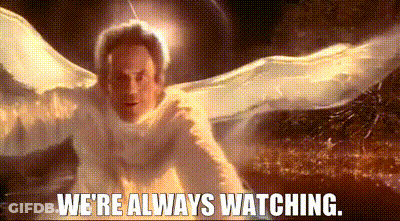 A Man In A White Angel Costume With The Words `` We 'Re Always Watching '' Written Below Him GIF