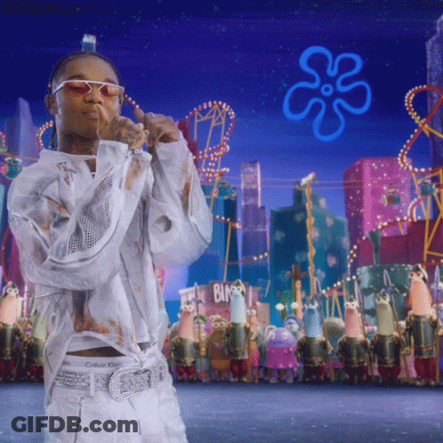 A Man In A White Calvin Klein Shirt Stands In Front Of A Spongebob Scene GIF