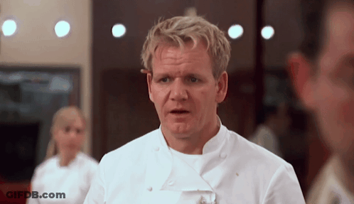 A Man In A White Chef 'S Uniform Looks At The Camera With His Mouth Open GIF