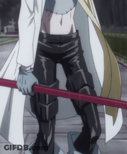 A Man In A White Coat And Black Pants Holding A Red Stick GIF