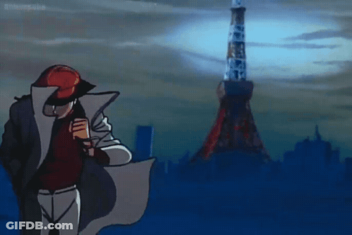Man In White Coat In Front Of Tokyo Tower GIF