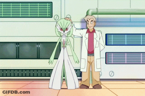 A Man In A White Coat Stands Next To A Cartoon Character GIF