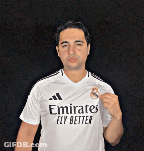 A Man In A White Emirates Fly Better Shirt GIF