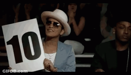 A Man In A White Hat Is Holding Up A Sign That Says 10 GIF
