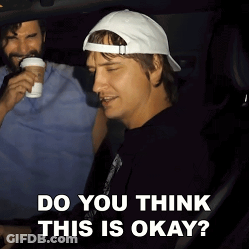 A Man In A White Hat Is Sitting In A Car With The Words Do You Think This Is Okay Below Him GIF