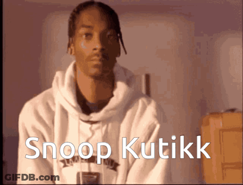 A Man In A White Hoodie With The Words Snoop Kutikk On The Bottom GIF