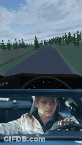 A Man In A White Jacket Is Driving A Car With The Number 5 On The Dashboard GIF