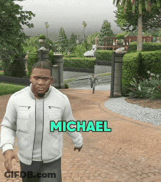 A Man In A White Jacket Is Walking Down A Path With The Name Michael Above Him GIF