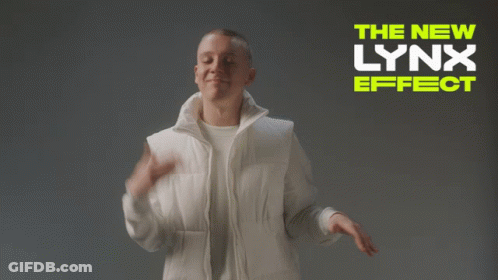 A Man In A White Jacket Stands In Front Of A Sign That Says " The New Lynx Effect " GIF